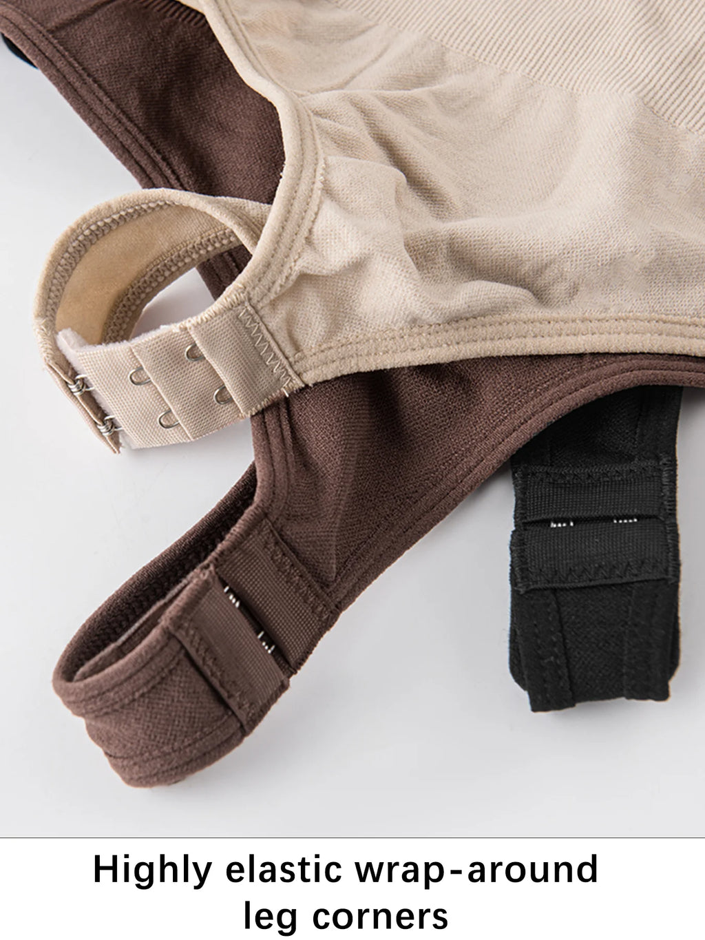 Close-up of a brown and beige garment with elastic wrap-around leg corners on a white background.